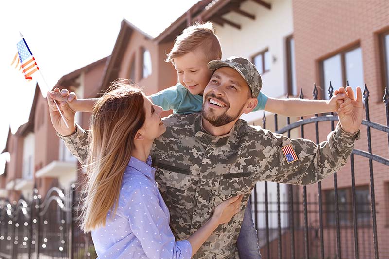 Smiling veteran with family